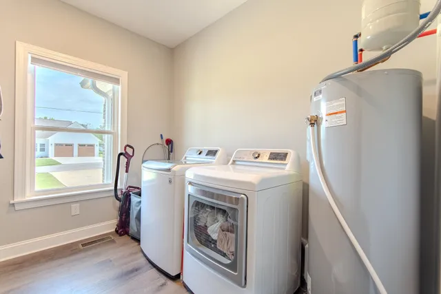 a utility room with dryer and washer