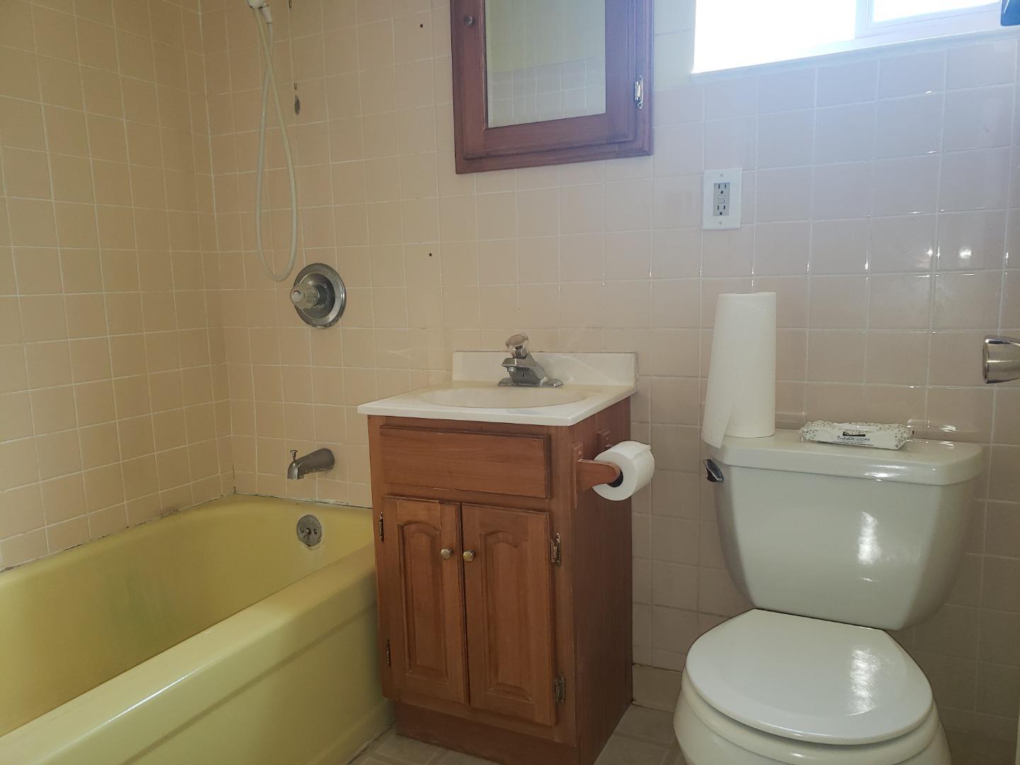 562 Leslie Drive Salinas, CA 93906 - Photo 16 of 21 a bathroom with a sink toilet and shower