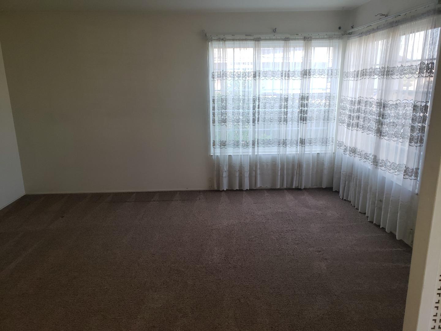 562 Leslie Drive Salinas, CA 93906 - Photo 3 of 21 a view of an empty room with a window
