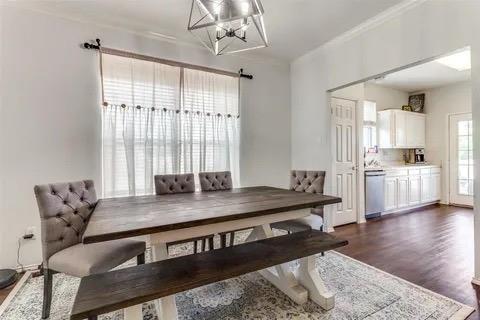 125 Timber Cross Court Azle, TX 76020 - Photo 6 of 17 a view of a dining room with furniture and wooden floor