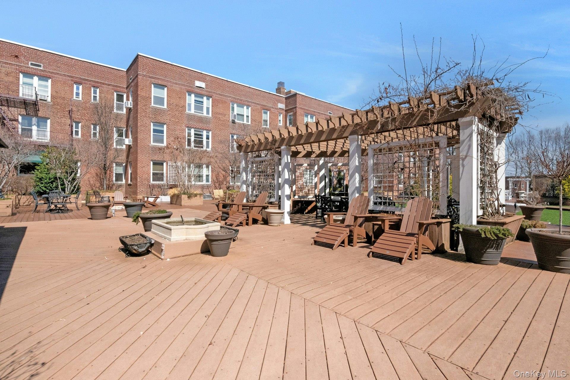 101 Old Mamaroneck Road, Unit 2C5 White Plains, NY 10605 - Photo 34 of 35 a view of a building with sitting area