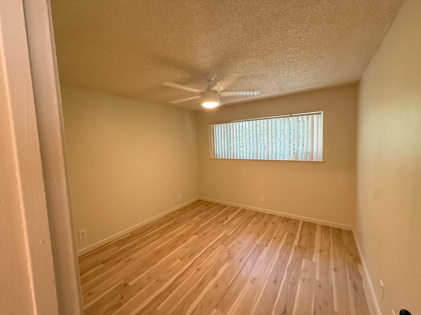 2505 Prescott Road, Unit 1 Modesto, CA 95350 - Photo 26 of 42 wooden floor in an empty room with a window