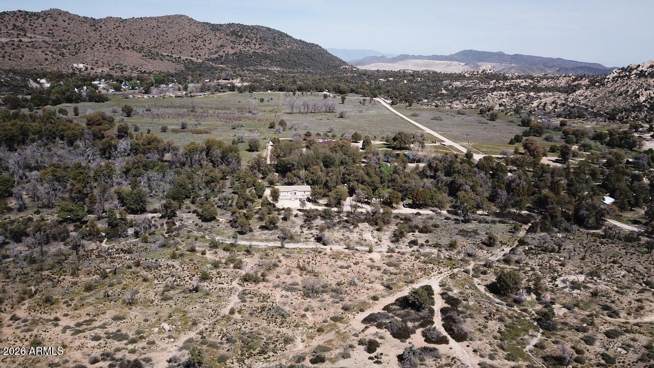 51092 North Pinal Ranch Road Miami, AZ 85539 - Photo 2 of 13 an aerial view of residential house and sandy dunes