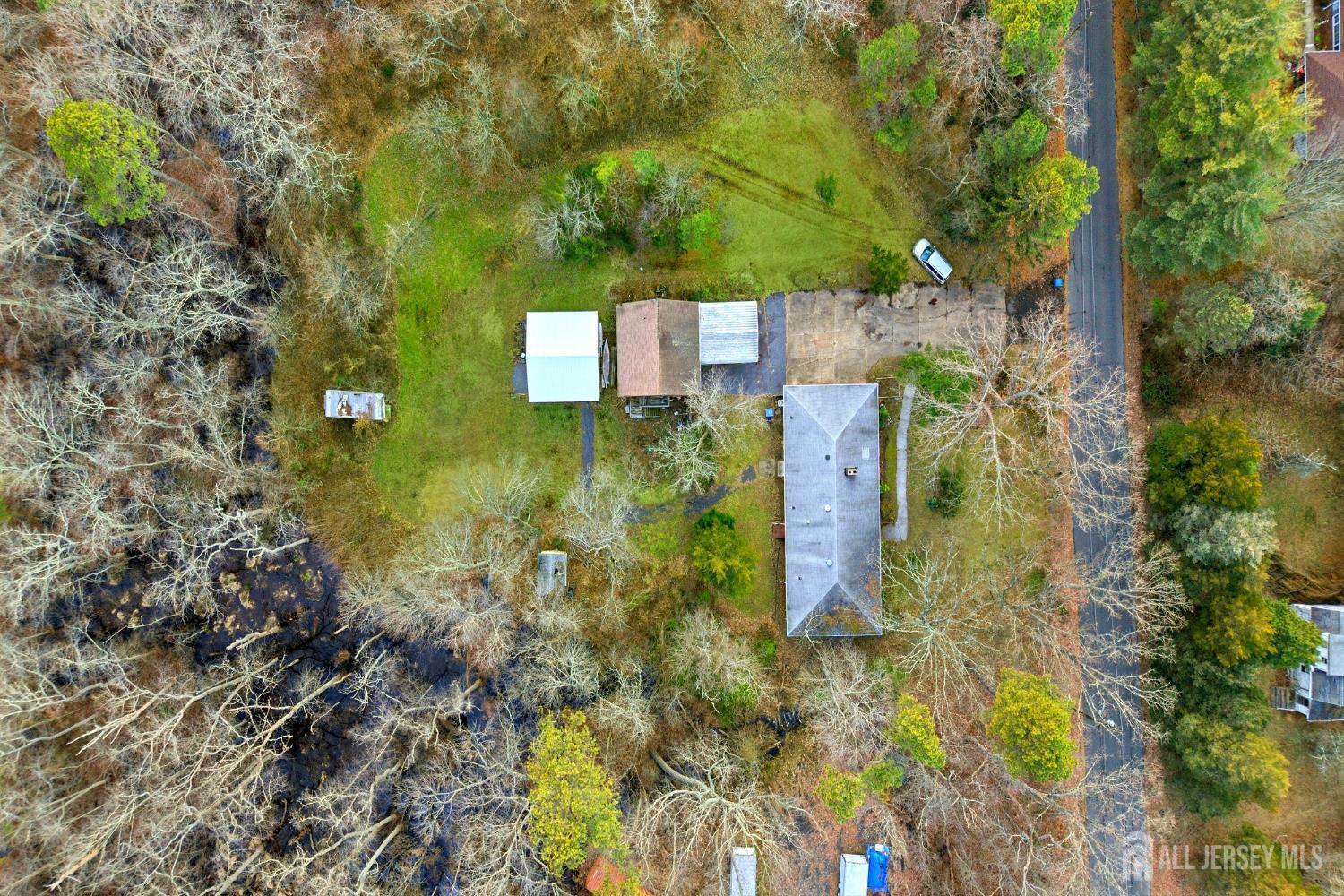 21 Pine Street Old Bridge, NJ 08857 - Photo 28 of 31 a backyard of a house with outdoor seating and yard