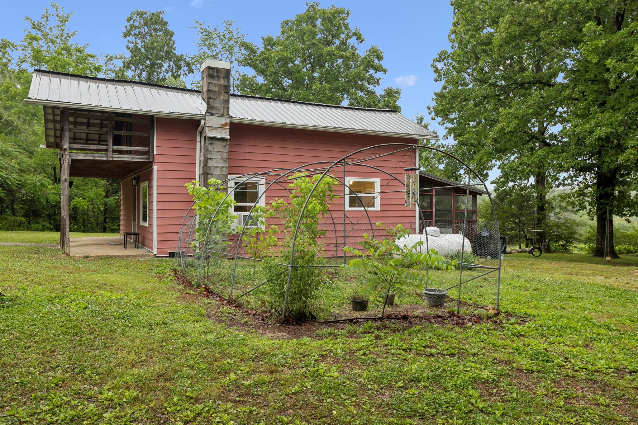 121 Hannah Road Summertown, TN 38483 - Photo 43 of 52 a view of a back yard of the house