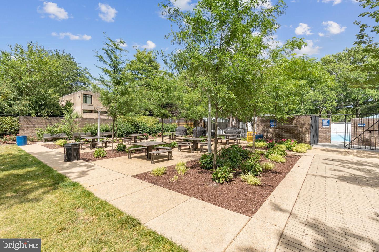 1311 Delaware Avenue Southwest, Unit S330 Washington, DC 20024 - Photo 24 of 33 a view of a backyard with sitting area