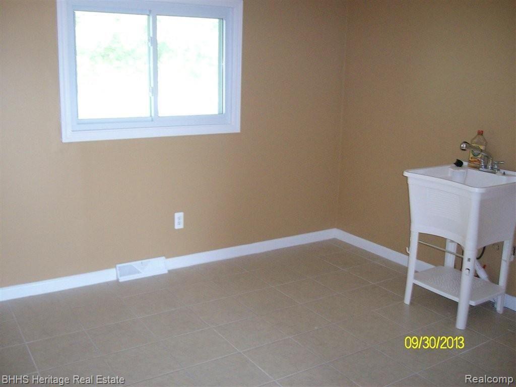 4902 Cemetery Road Fowlerville, MI 48836 - Photo 16 of 17 4902 laundry to mud room.jpg