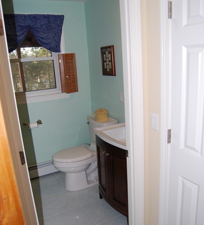 17 Faulkner Hill Road Acton, MA 01720 - Photo 16 of 25 a bathroom with a toilet and a sink