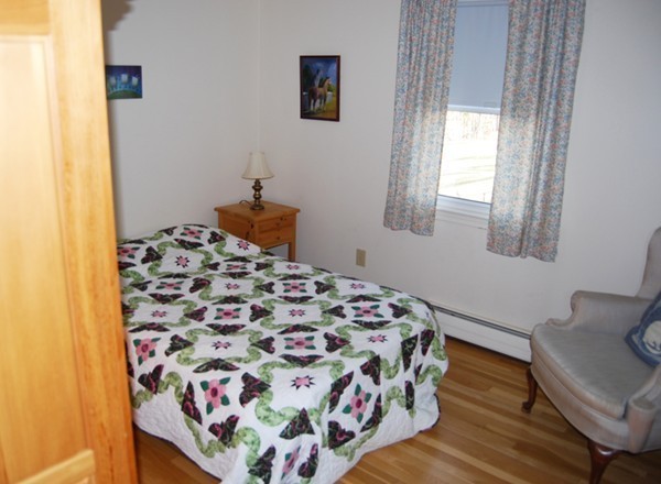 17 Faulkner Hill Road Acton, MA 01720 - Photo 17 of 25 a bedroom with a bed and a window