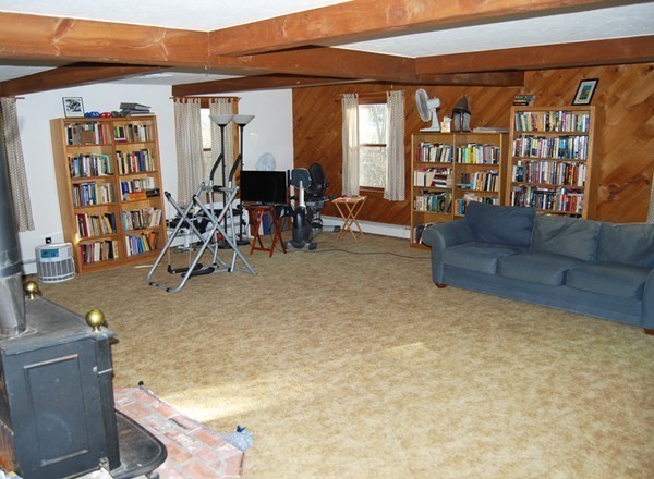 17 Faulkner Hill Road Acton, MA 01720 - Photo 19 of 25 a living room with furniture