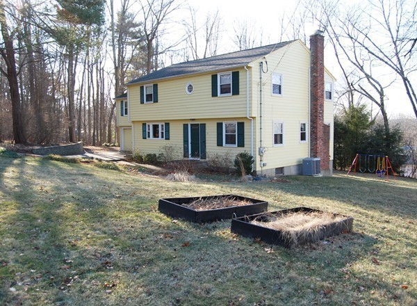 17 Faulkner Hill Road Acton, MA 01720 - Photo 20 of 25 a view of a white house with a yard