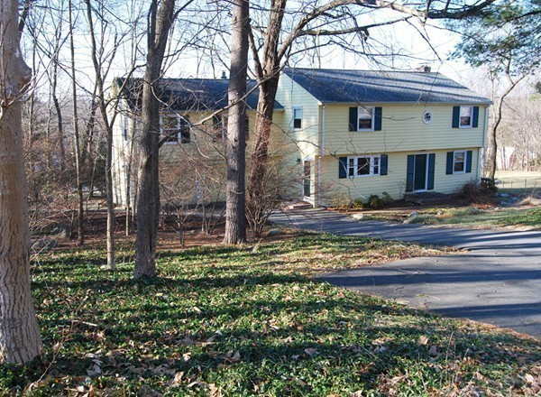 17 Faulkner Hill Road Acton, MA 01720 - Photo 25 of 25 a view of a house with a yard and tree s