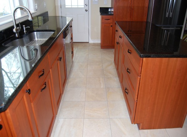 17 Faulkner Hill Road Acton, MA 01720 - Photo 5 of 25 a view of a kitchen from the stairs