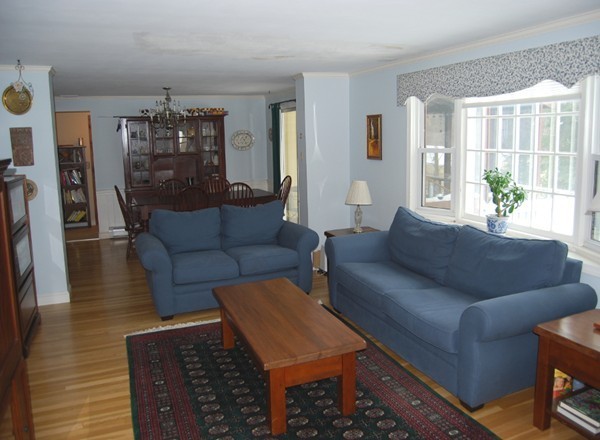 17 Faulkner Hill Road Acton, MA 01720 - Photo 7 of 25 a living room with furniture and a window