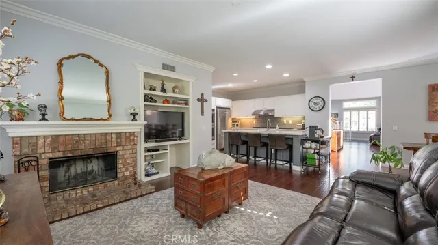 a kitchen with appliances cabinets and furniture