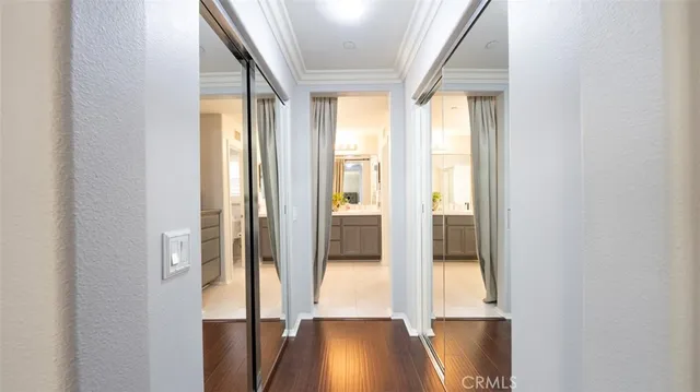 a bathroom with a granite countertop sink a bathtub and next to a window