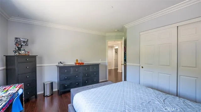 a bathroom with a sink toilet and a mirror