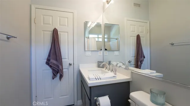 a room with furniture and flat screen tv