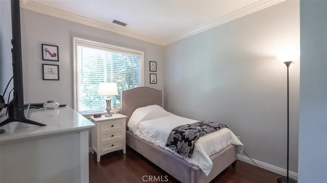 a view of a house with wooden floor and a window