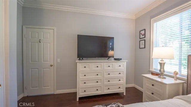a view of a chair and table in the garden