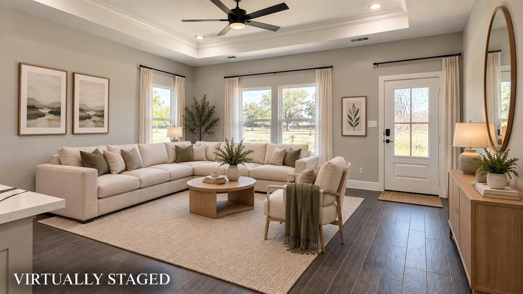 302-304 West Pine Street Whitewright, TX 75491 - Photo 10 of 38 Tray ceiling with recessed lighting and a ceiling fan, multiple windows, and a glass-paned exterior door