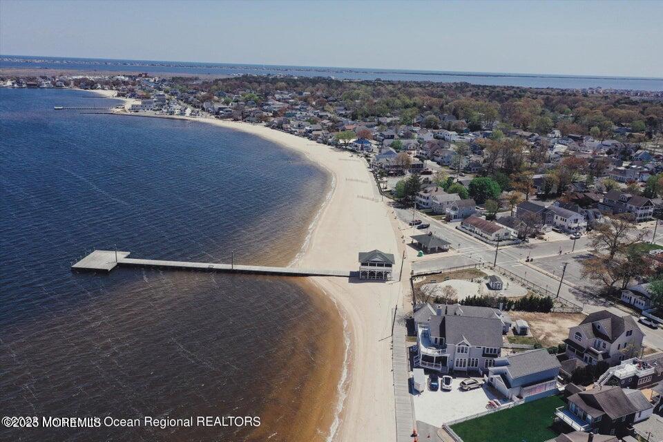 409 Newport Avenue Ocean Gate, NJ 08740 - Photo 21 of 22 an aerial view of a house with a yard