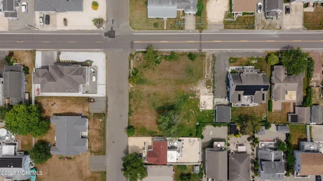 an aerial view of a house with a garden