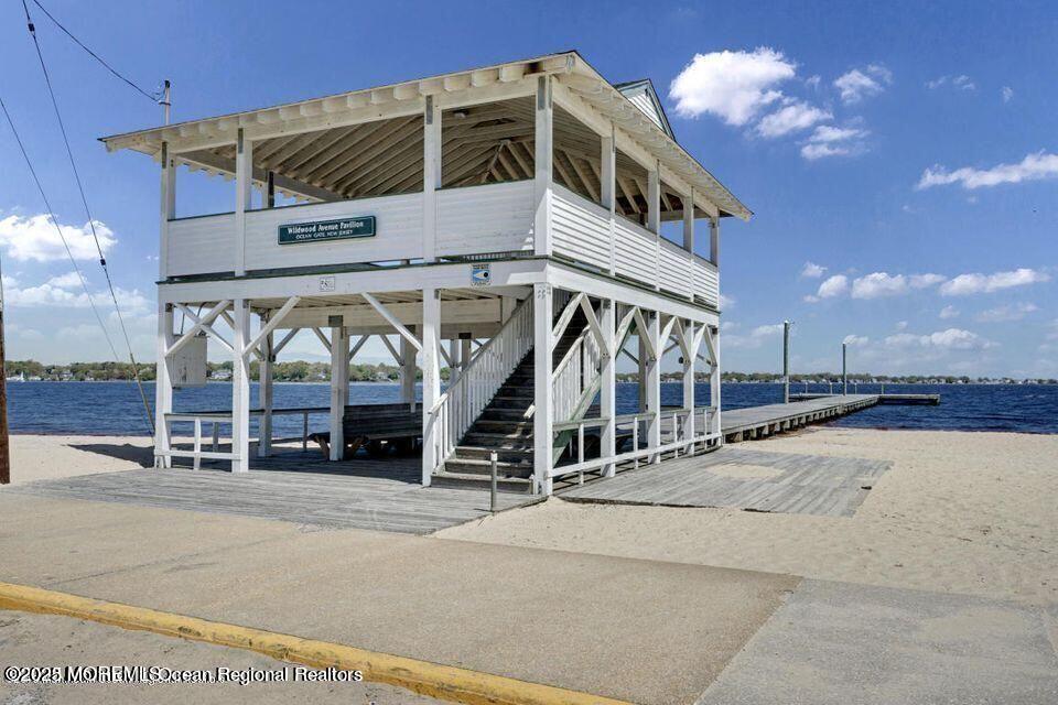 409 Newport Avenue Ocean Gate, NJ 08740 - Photo 7 of 22 a glass building with sign broad