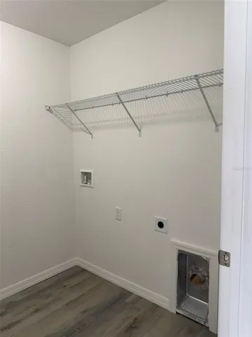 a view of a room with racks on the wall