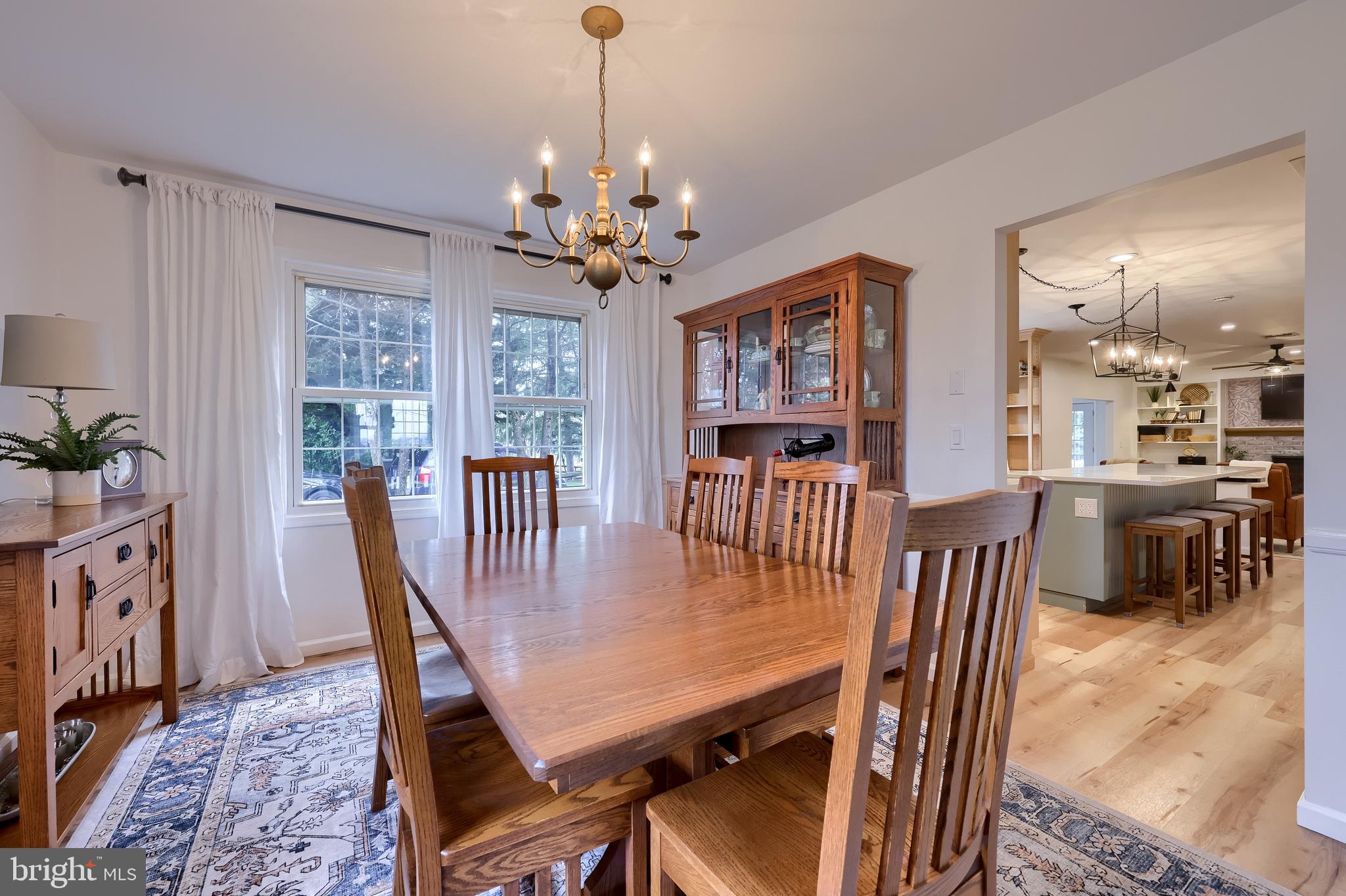 701 Colony Drive Palmyra, PA 17078 - Photo 12 of 51 a view of a dining room with furniture window and wooden floor