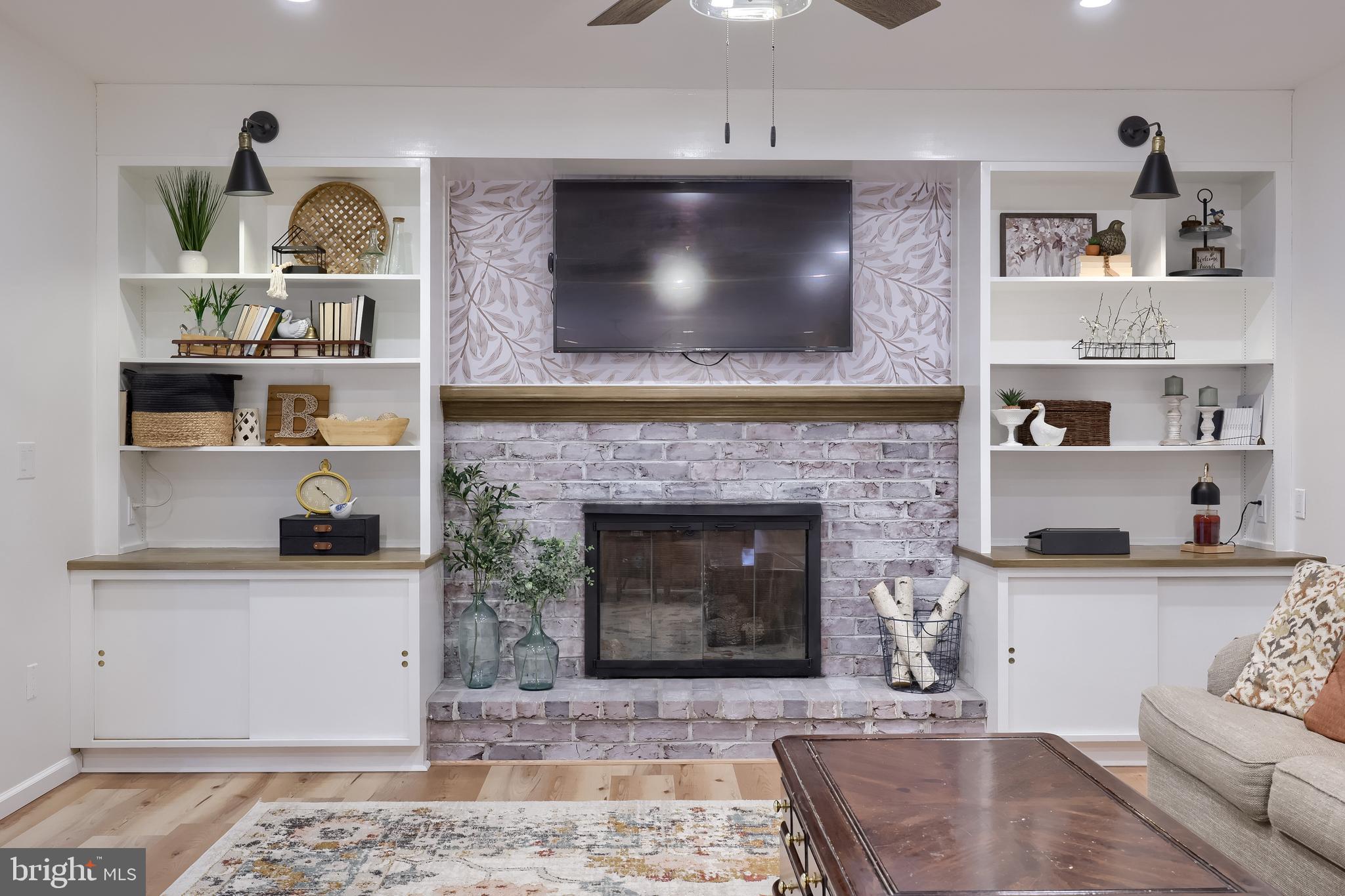 701 Colony Drive Palmyra, PA 17078 - Photo 23 of 51 a living room with furniture and a fireplace
