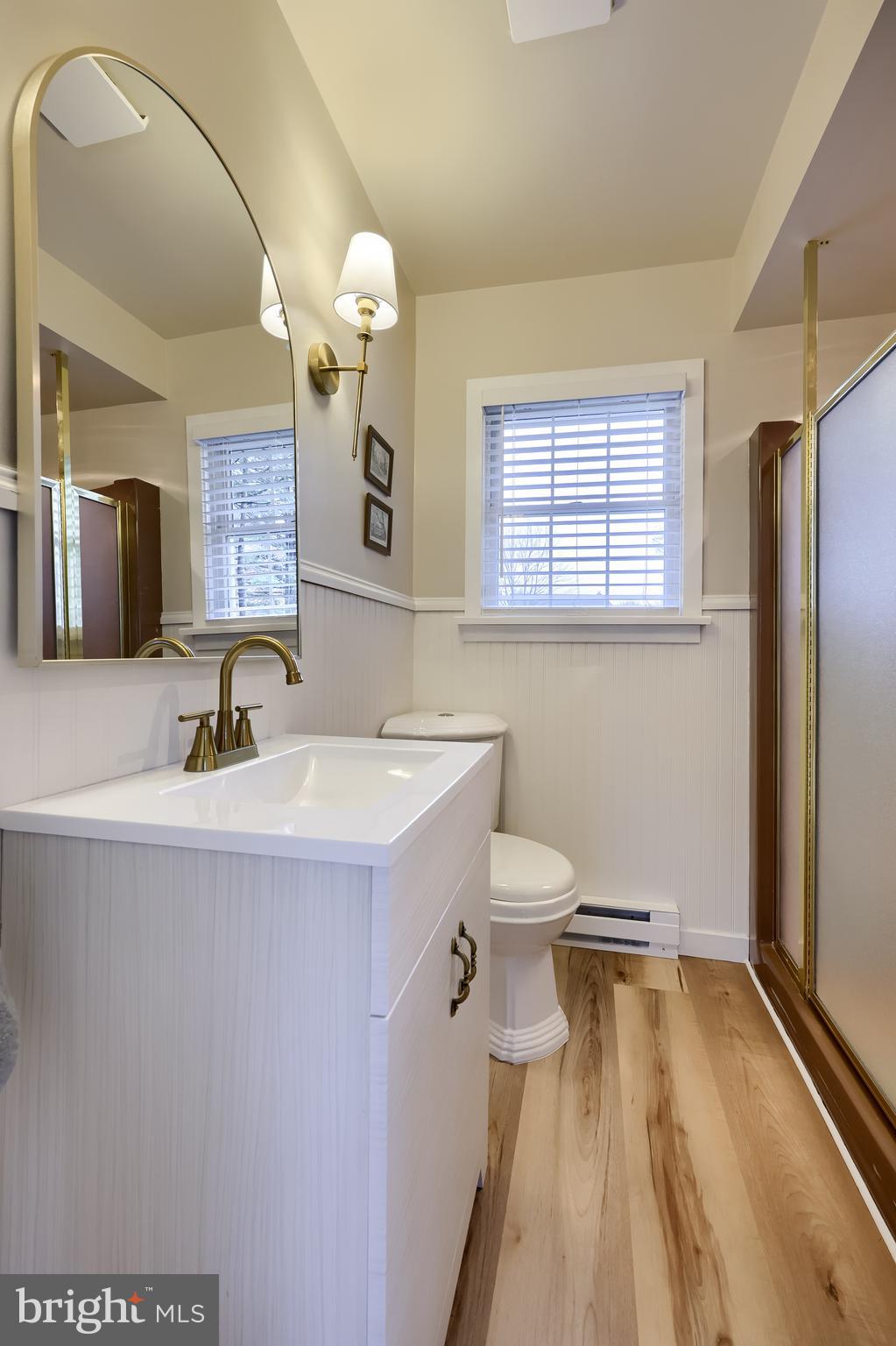 701 Colony Drive Palmyra, PA 17078 - Photo 30 of 51 a bathroom with a sink a toilet and a mirror