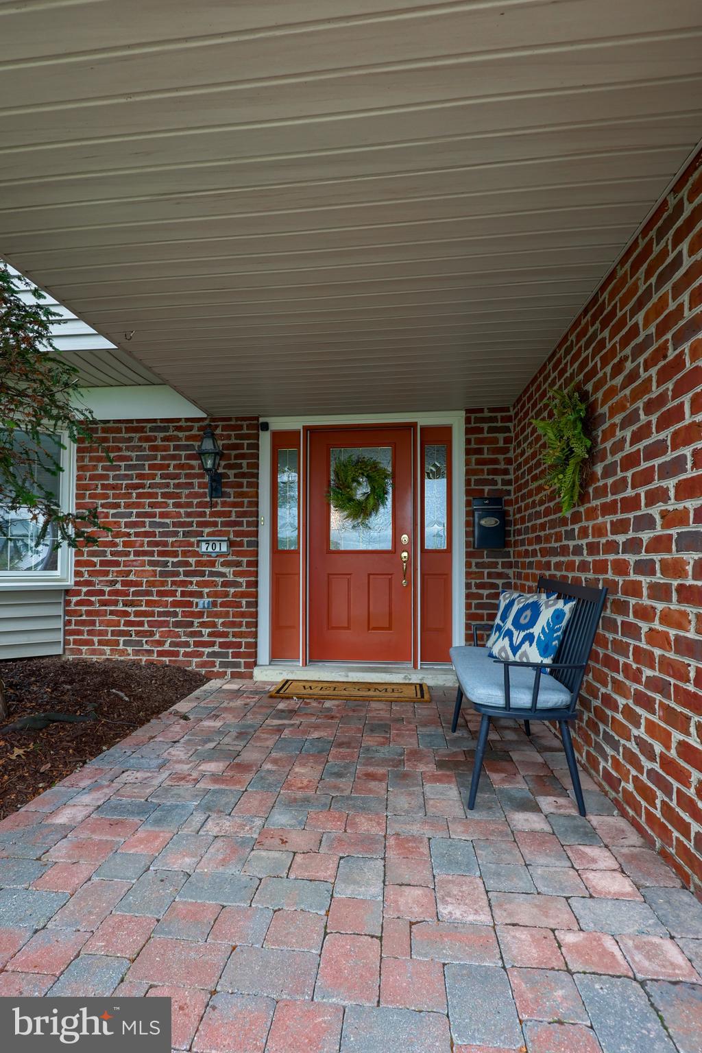 701 Colony Drive Palmyra, PA 17078 - Photo 46 of 51 a view of a patio with table and chairs with wooden floor and fence