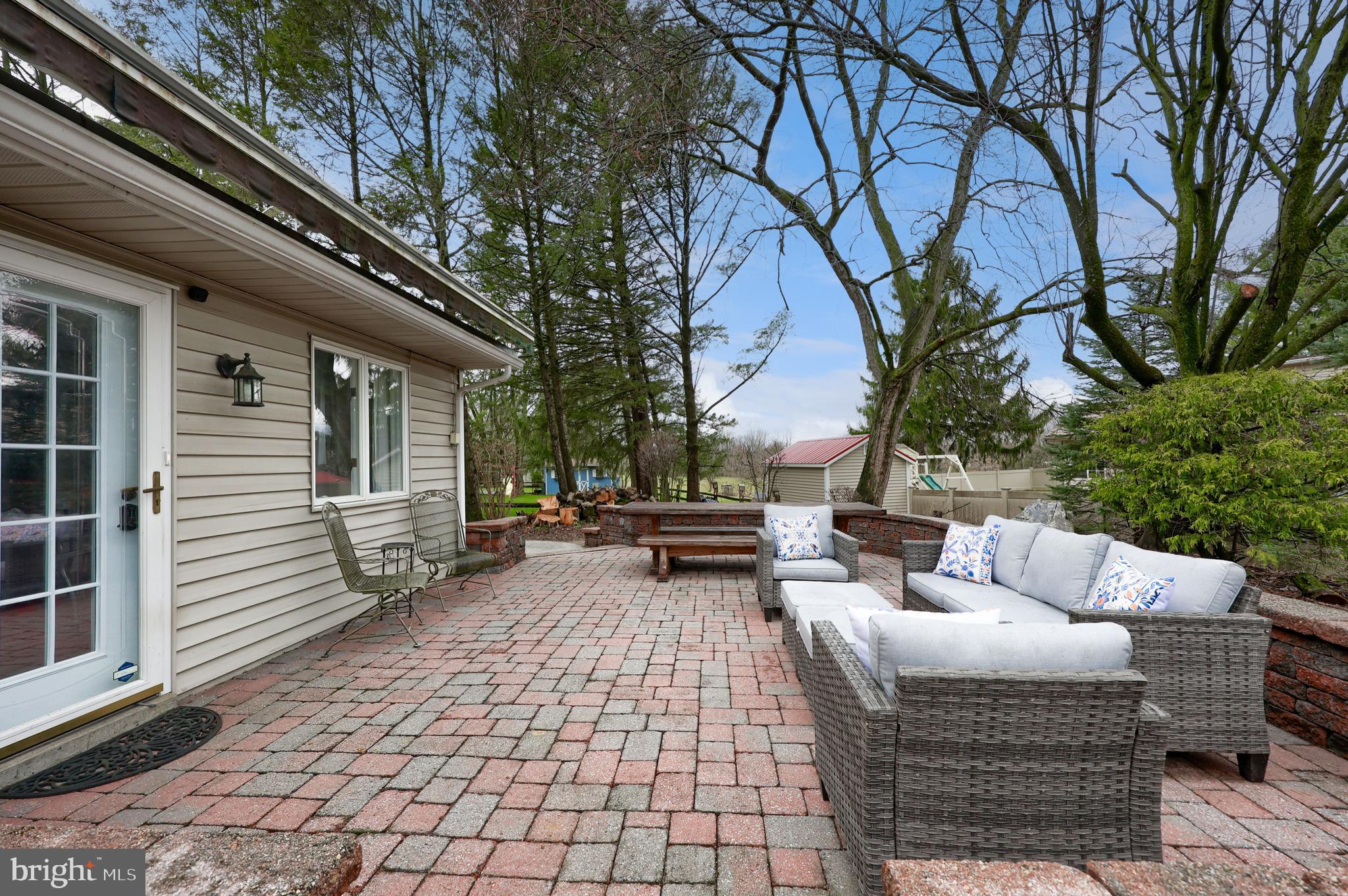 701 Colony Drive Palmyra, PA 17078 - Photo 51 of 51 a view of a patio with couches and a fire pit