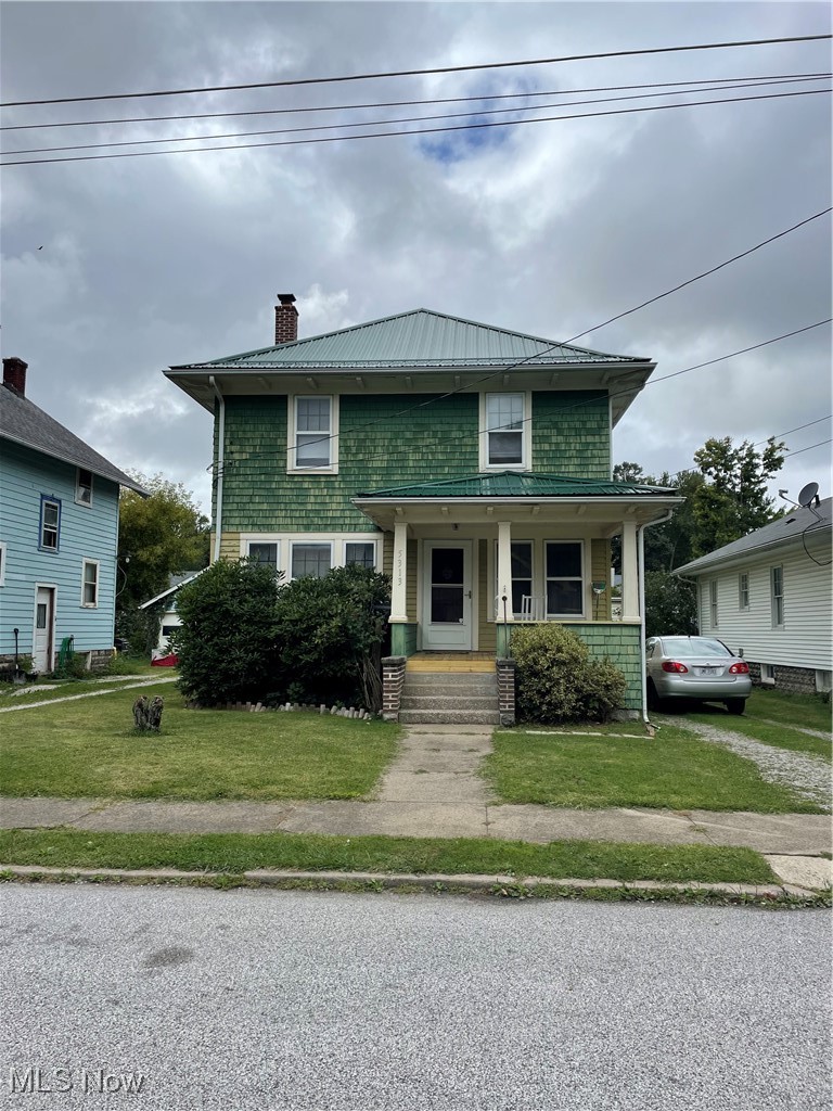 5313 Reed Avenue Ashtabula, OH 44004 - Photo 1 of 18 Bungalow featuring a front lawn and covered porch