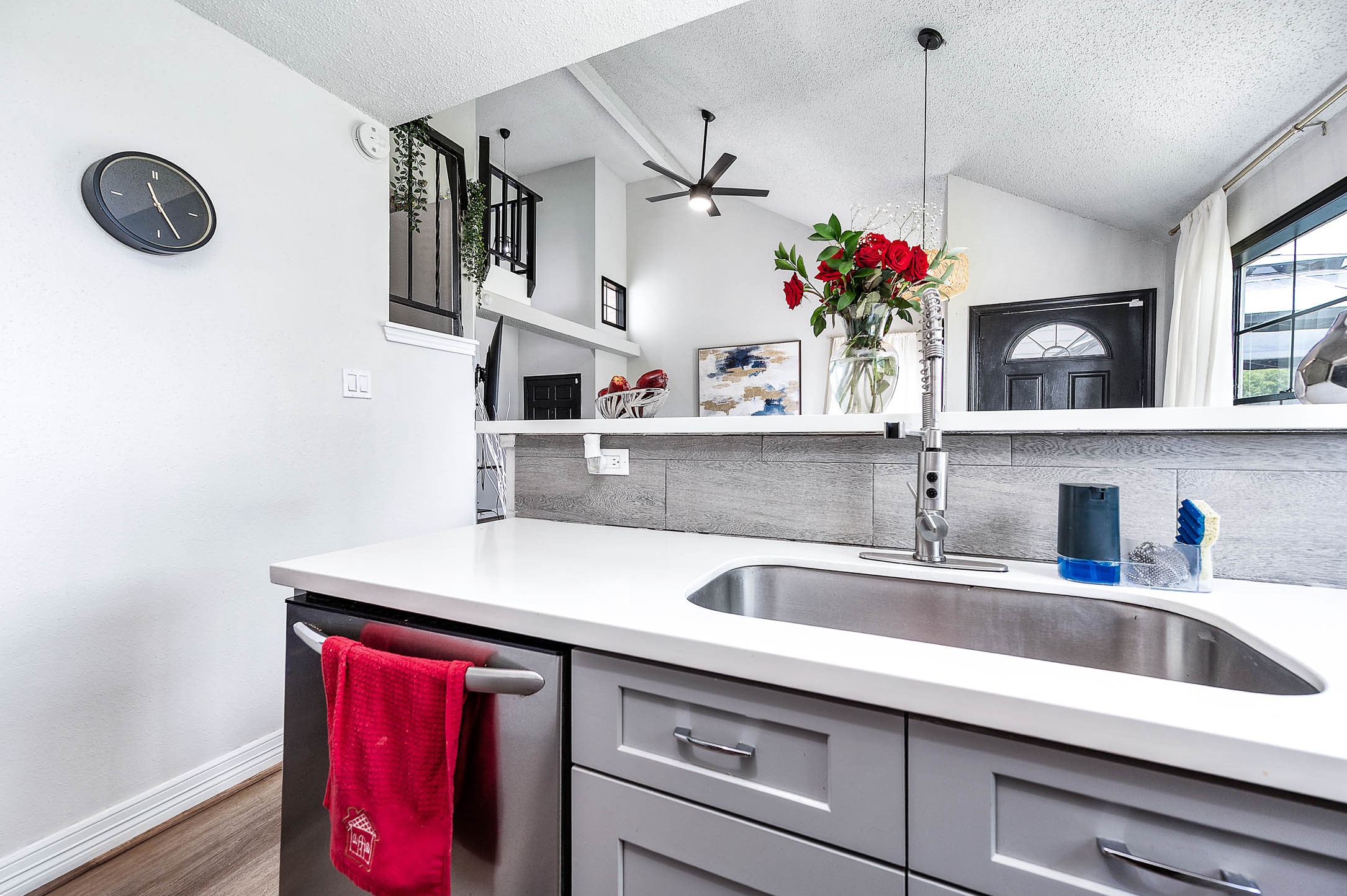 18446 North Willow Bluff Road Katy, TX 77449 - Photo 13 of 31 a kitchen with sink cabinets and window