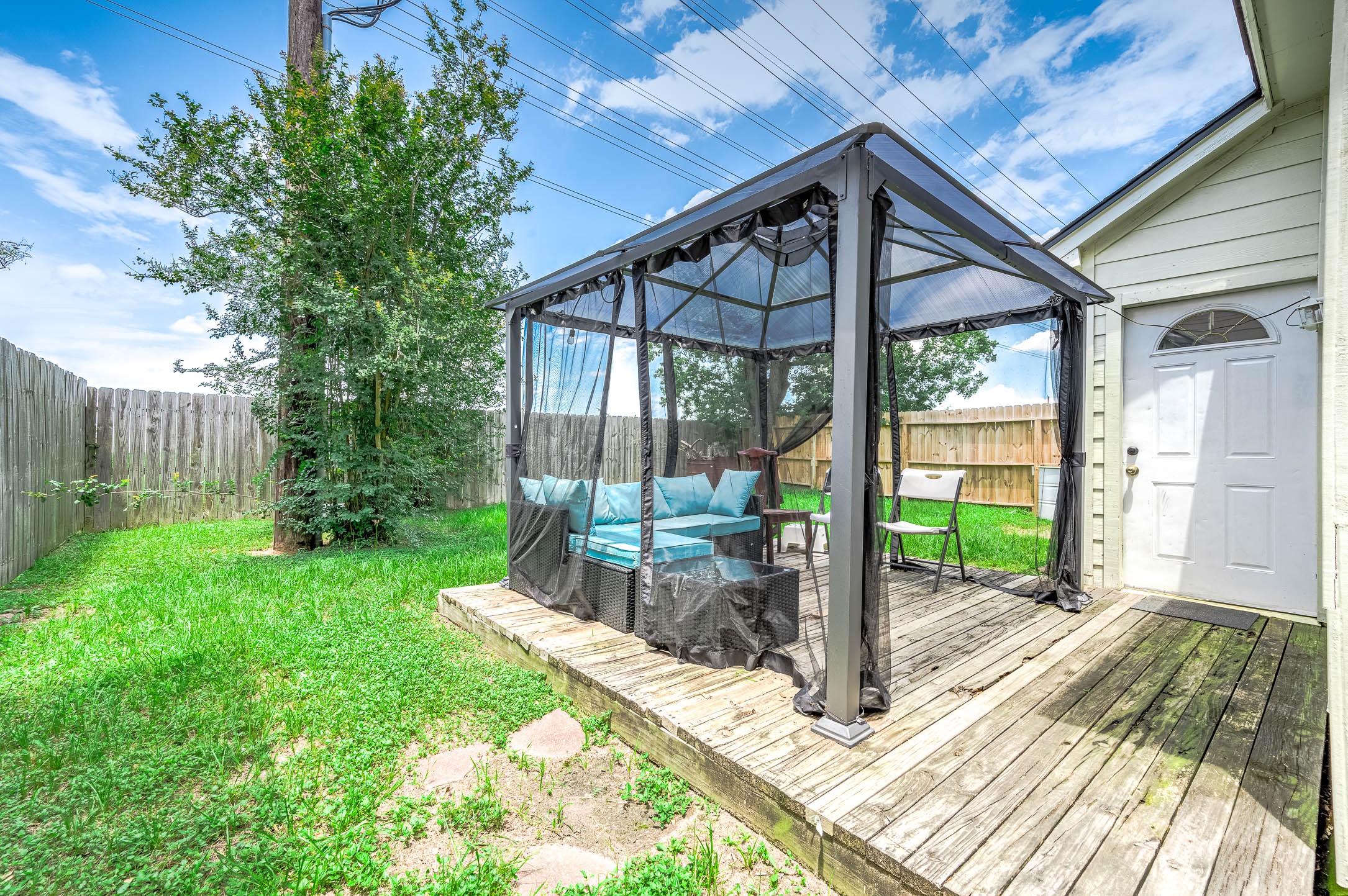 18446 North Willow Bluff Road Katy, TX 77449 - Photo 28 of 31 a view of a patio with a backyard