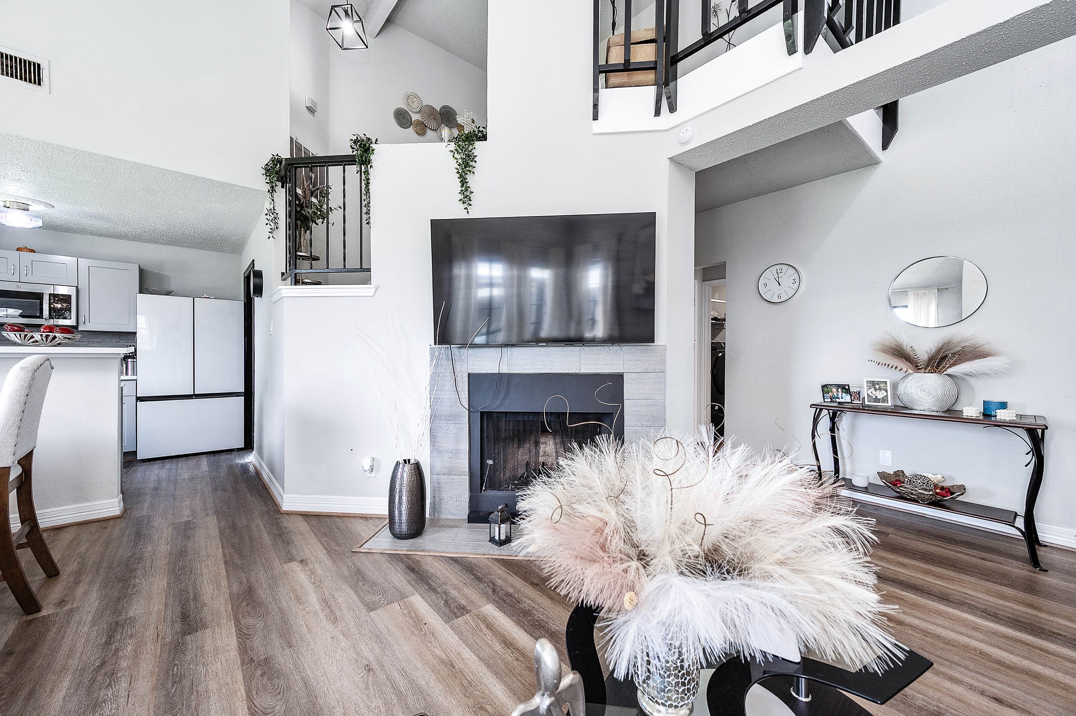 18446 North Willow Bluff Road Katy, TX 77449 - Photo 9 of 31 a living room with furniture and a fireplace