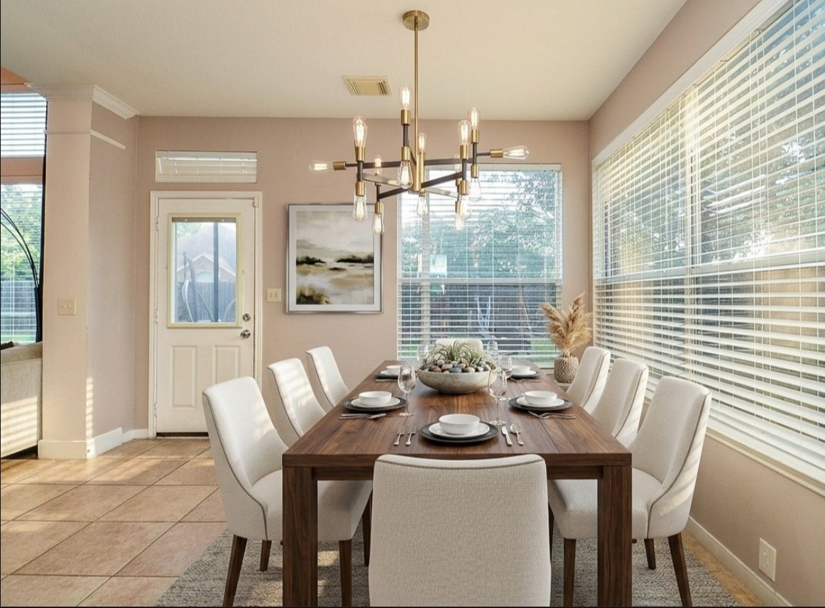 19802 Shavon Springs Drive Spring, TX 77388 - Photo 13 of 30 Bright and inviting breakfast area featuring a modern chandelier, large windows for natural light, and elegant seating for a perfect start to your day. Virtually staged