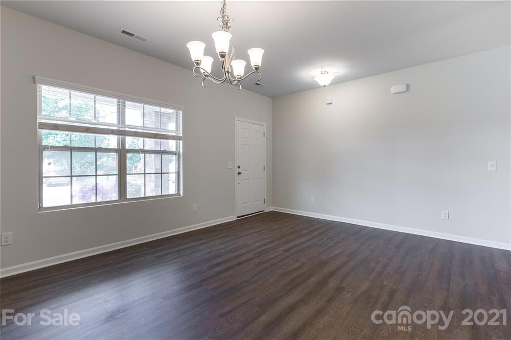 1556 Spring Blossom Trail Fort Mill, SC 29708 - Photo 3 of 22 a view of livingroom with window
