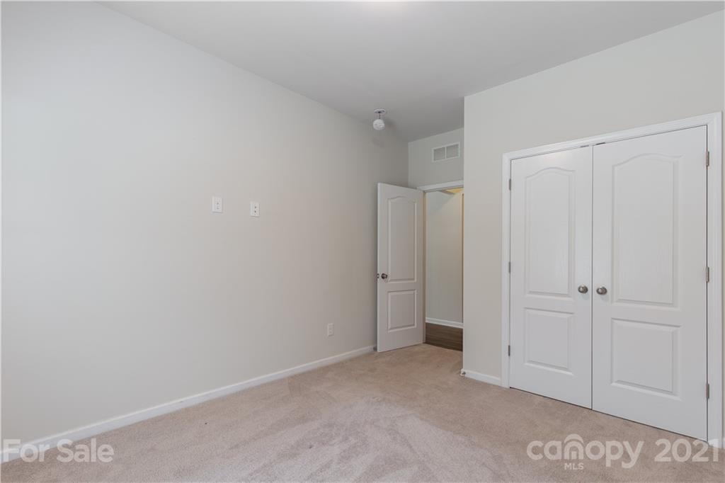 1556 Spring Blossom Trail Fort Mill, SC 29708 - Photo 10 of 22 a view of an empty room