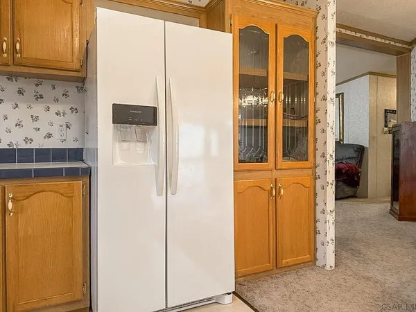 a view of a bathroom with a door and a window