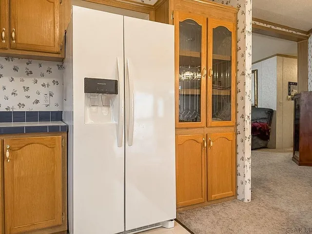 a view of a bathroom with a door and a window