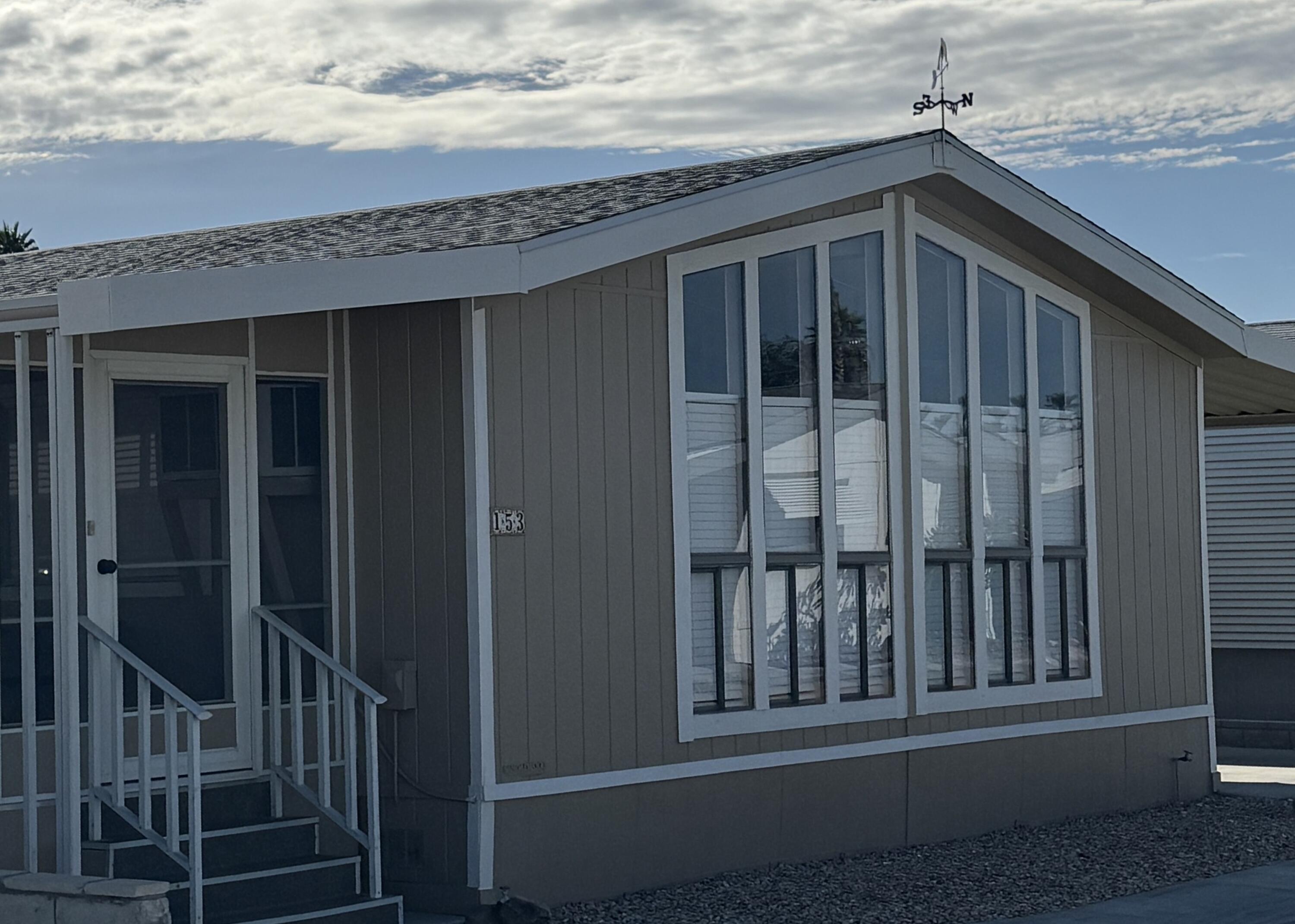 a view of a house with a balcony