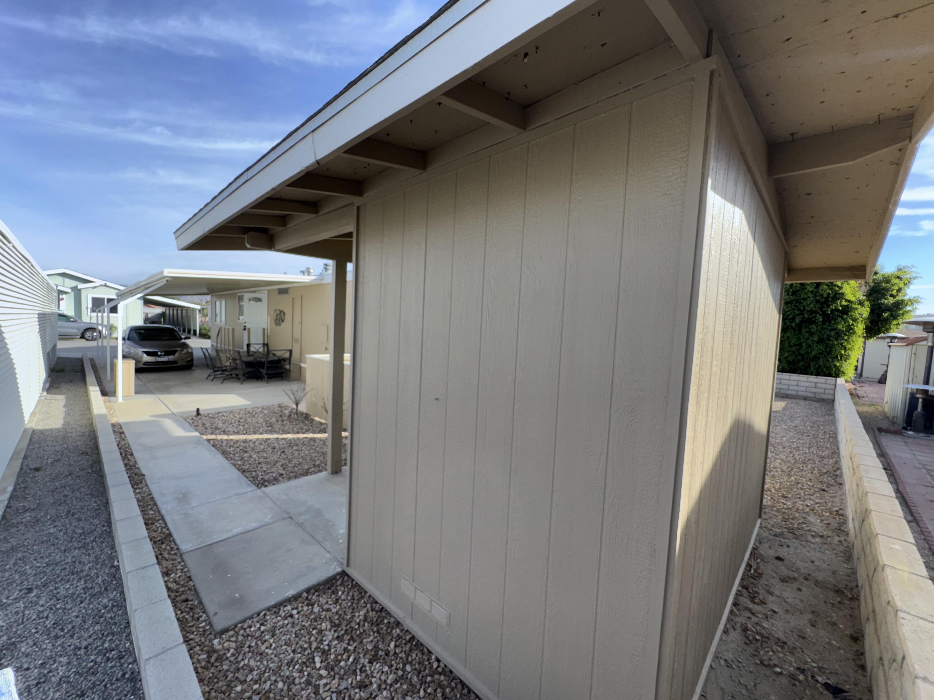 46618 Madison Street, Unit 153 Indio, CA 92201 - Photo 11 of 47 View to carport