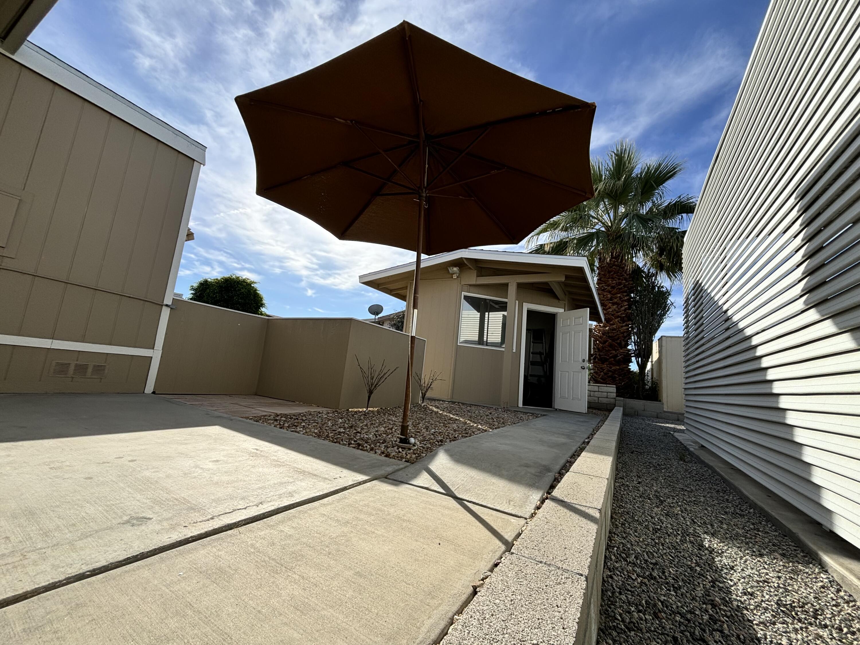 46618 Madison Street, Unit 153 Indio, CA 92201 - Photo 6 of 47 Shed/Grilling area