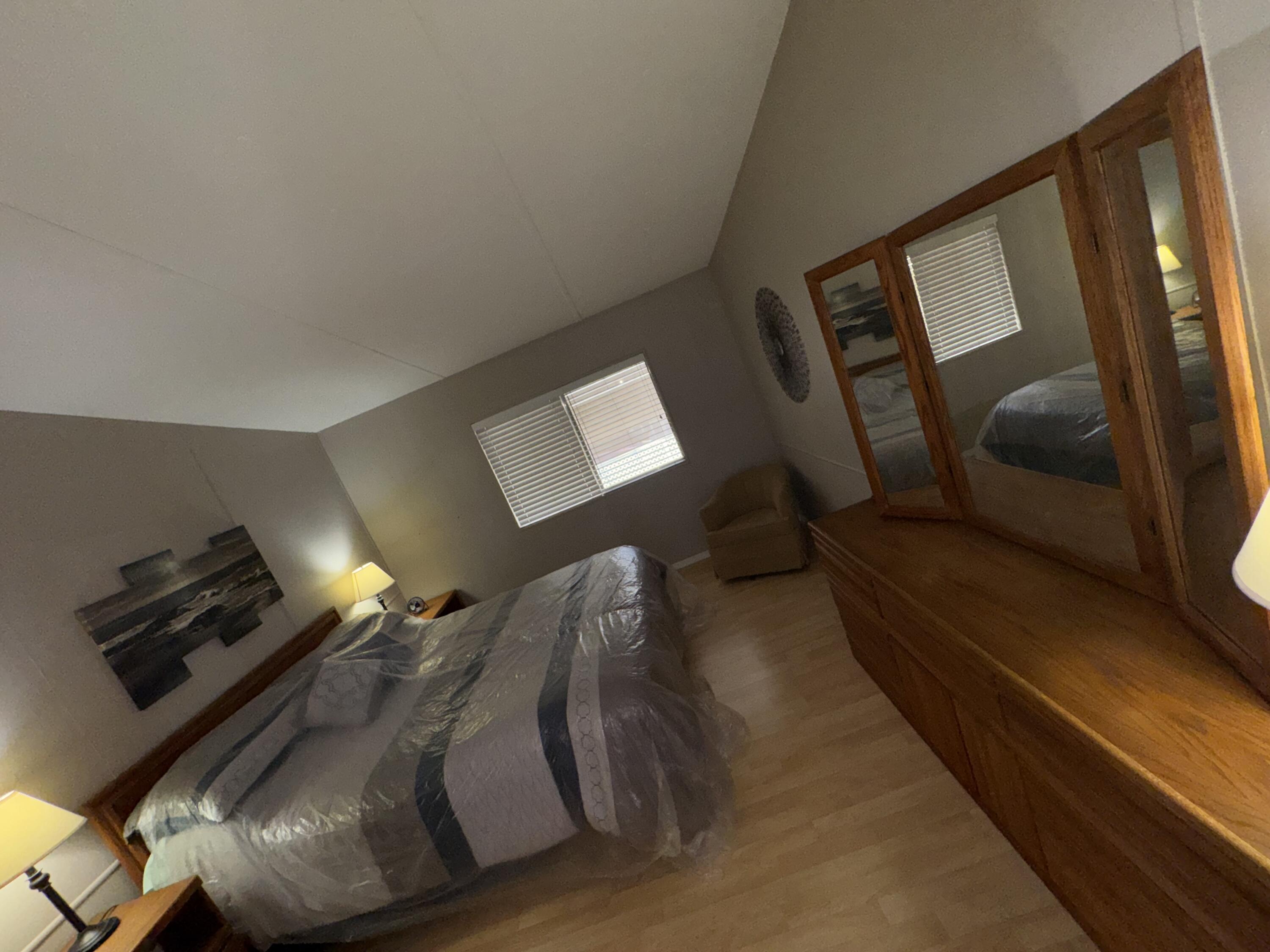 46618 Madison Street, Unit 153 Indio, CA 92201 - Photo 10 of 14 a living room with furniture