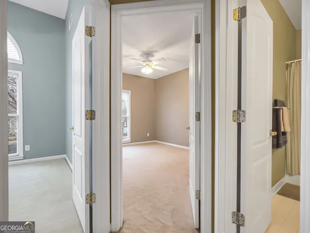 a view of entryway with wooden floor