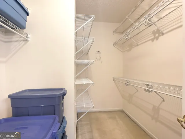 a view of a room with racks on the wall