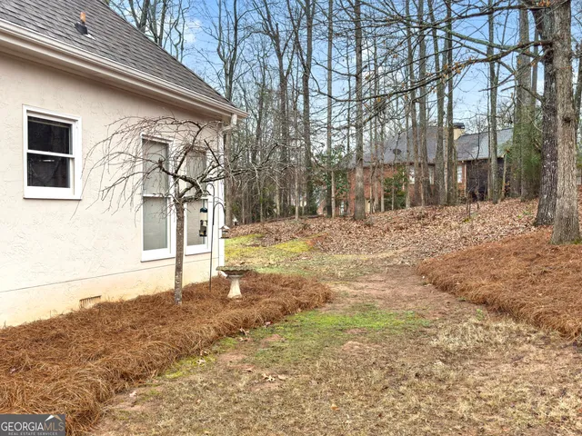 a view of a house with a snow in front of it